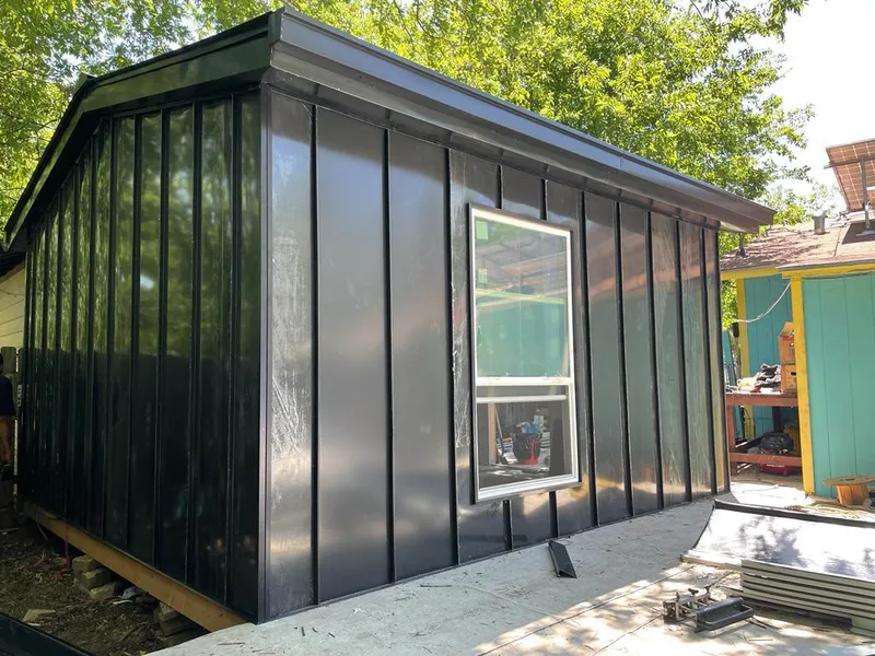 Black standing seam metal wall panels for Metal Roof Installation in Tonganoxie