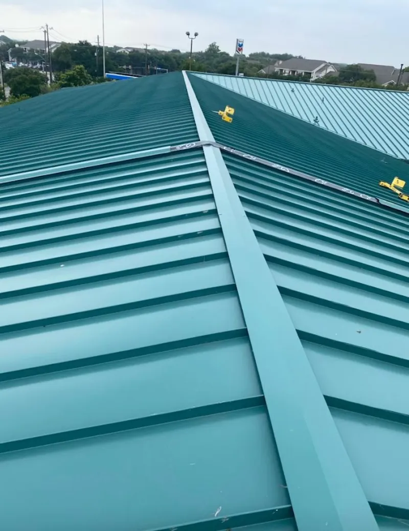 Green commercial metal roof ridge and valley for Metal Roof Repair in Tonganoxie