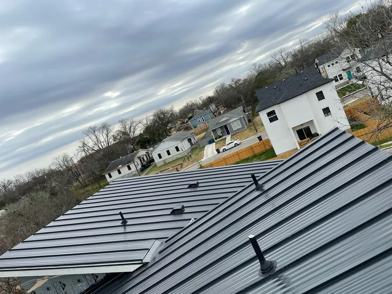 Standing seam metal roof panels with vents for Skylight Repair in Tonganoxie